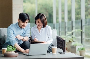 couple reading notebook